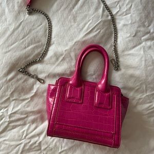 Hot pink hand held purse